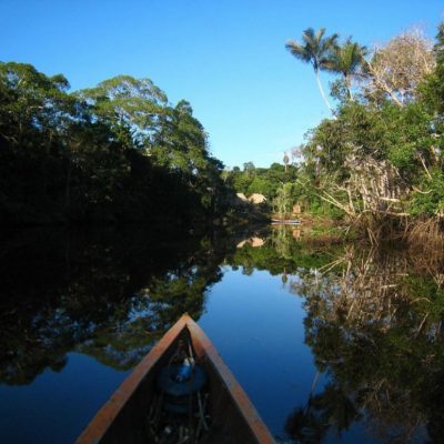 CUYABENO JUNGLE TOUR Surroundings - Canoe on river - Ecuador & Galapagos Tours